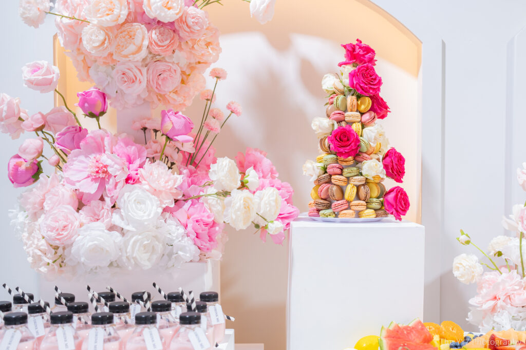 Colorful macarons and floral arrangements