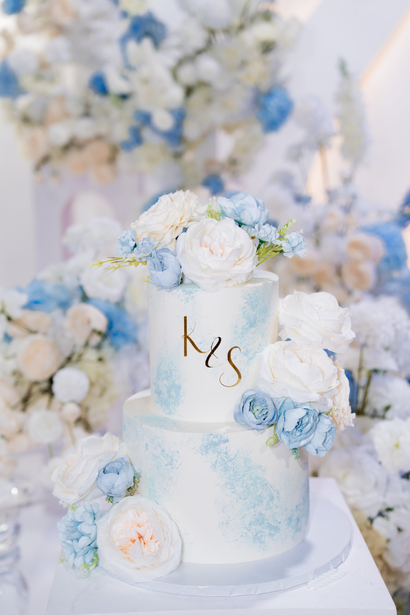 Elegant cake with blue floral decorations