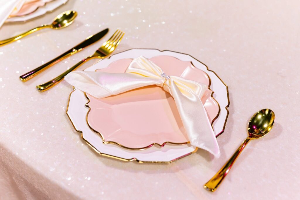 Elegant table setting with pink plates