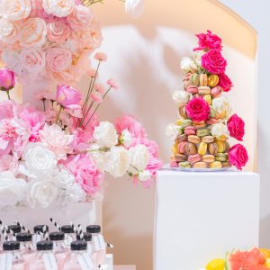 Colorful macarons and floral arrangements