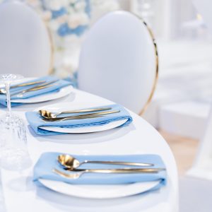 Elegant table setting with blue accents